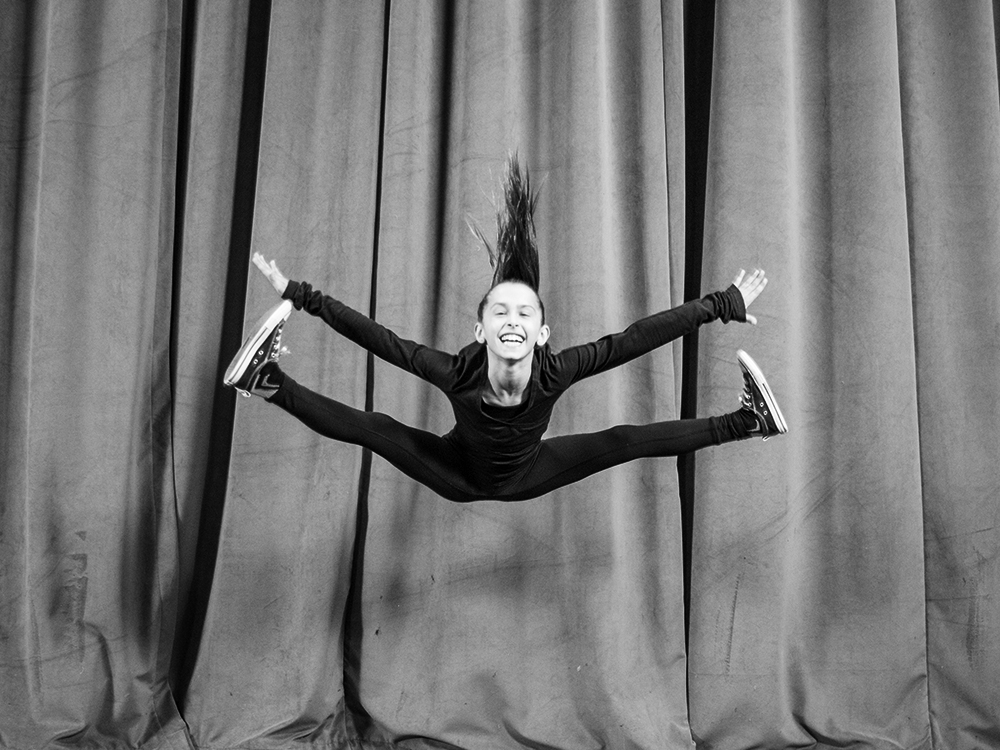 Girl leaping in acro dance class for kids in Calgary Alberta